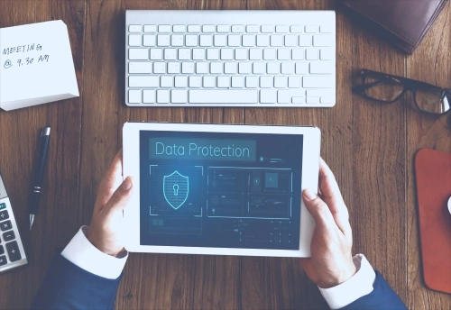 Data Encryption hands working on digital device network