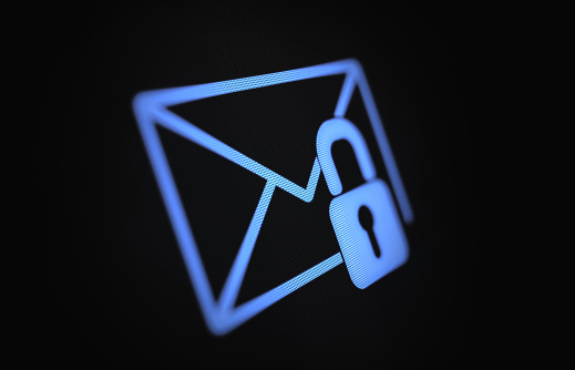 Internet and e mail security concept on lack digital screen. Blue At sign is being protected by  a padlock. Horizontal composition with copy space. Clipping path is included.